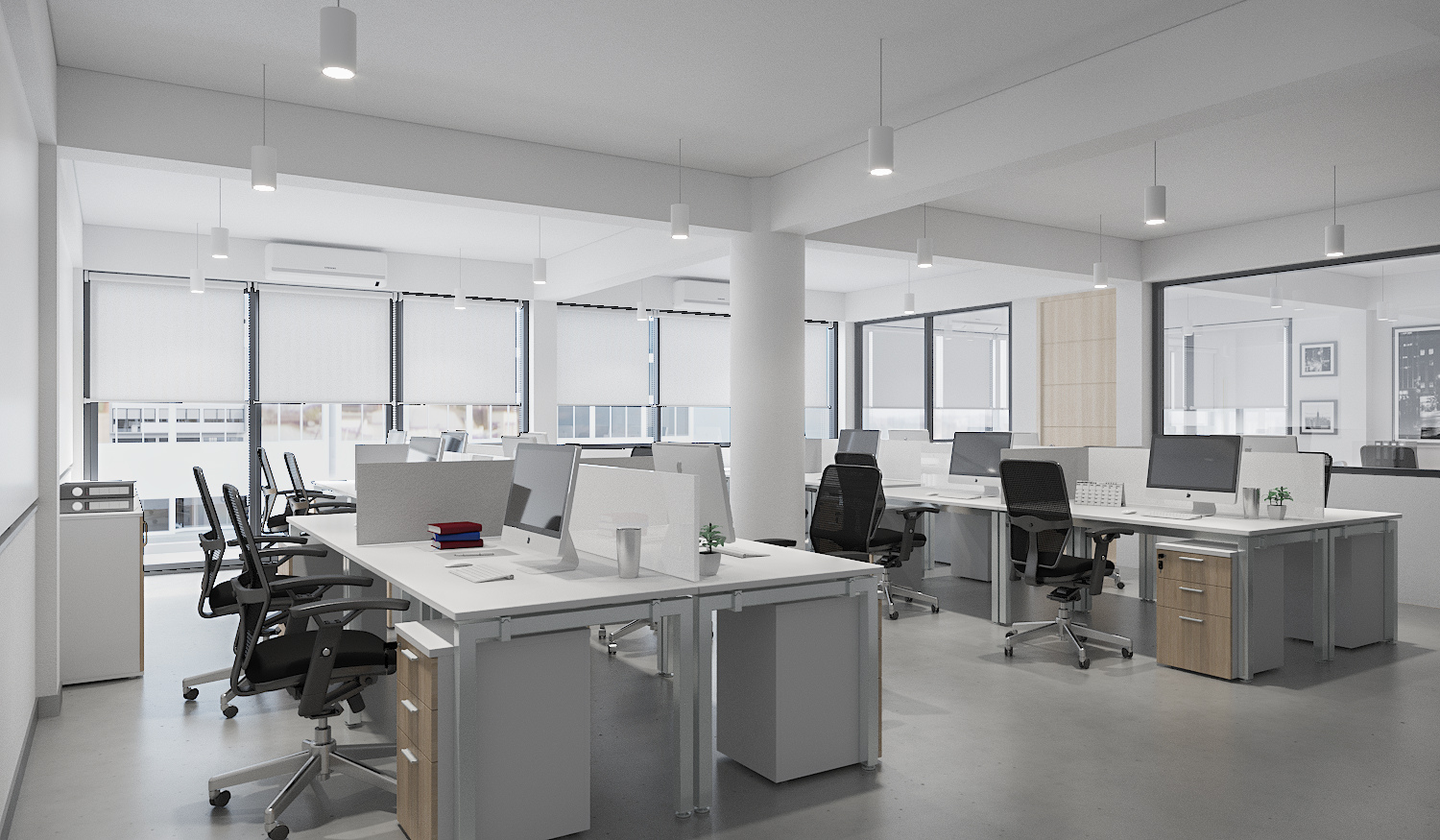 Third-floor open-plan office with rows of workstations in daylight at Romrawin head office