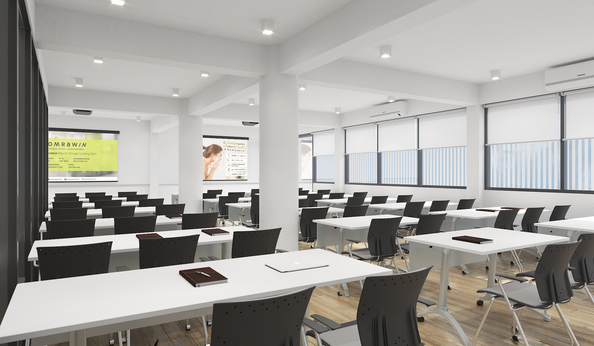 Training room with rows of seating and presentation wall at Romrawin head office, Bangkok