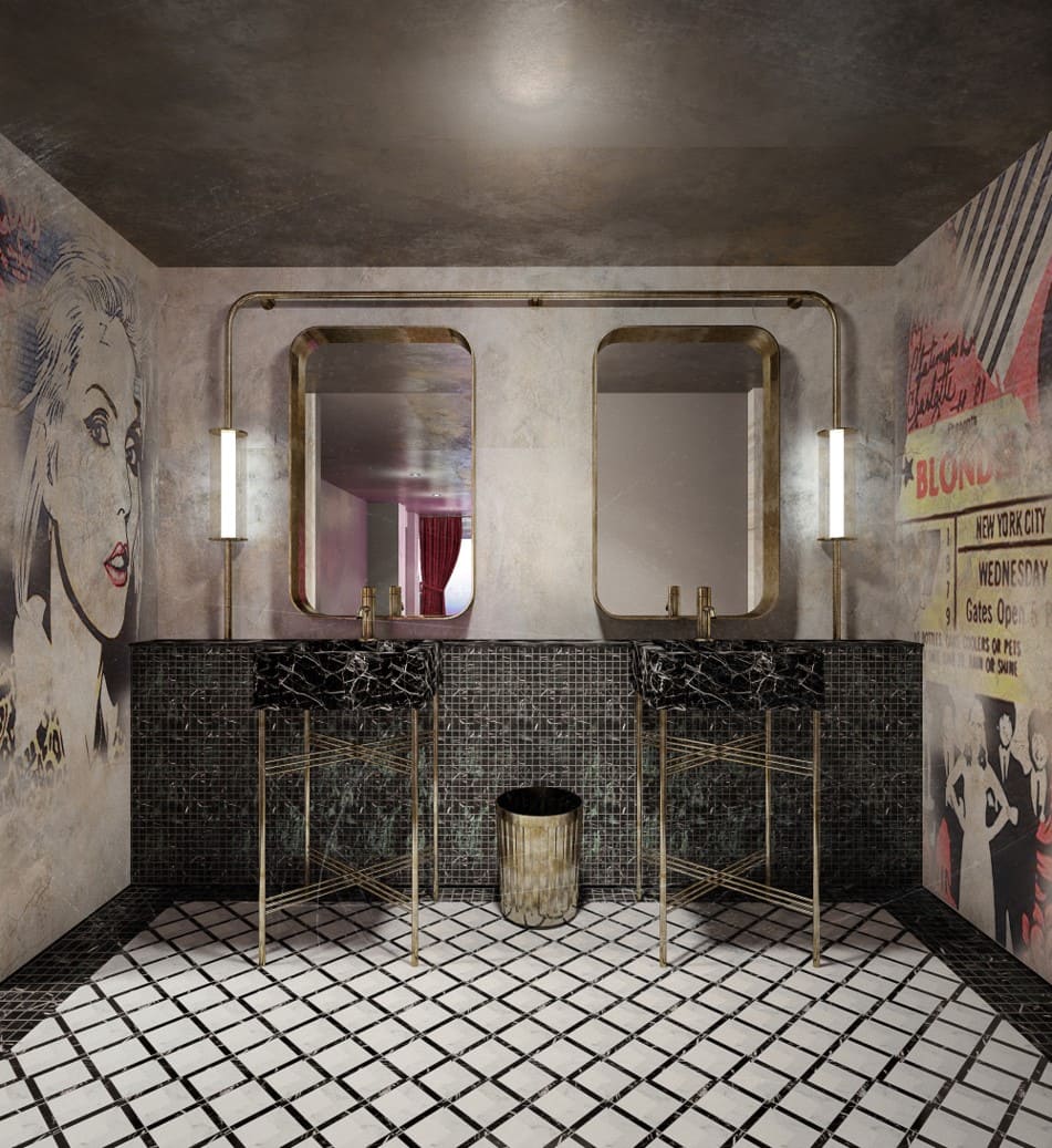 Washroom at CRU Chidlom with hand-painted graffiti walls, black mosaic tiling, brass-framed mirrors and a chequerboard floor