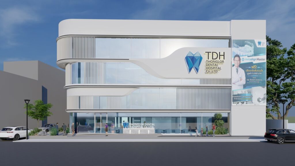 Thonglor Dental Hospital Ramintra exterior, curved white façade with TDH signage