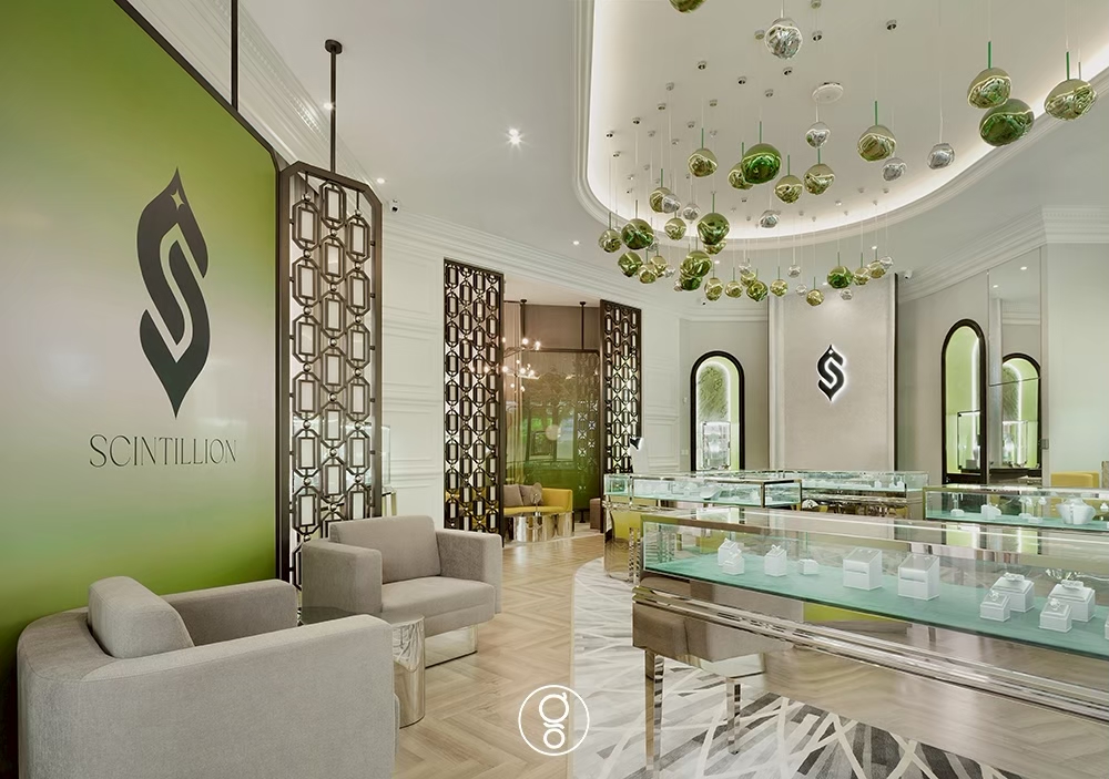 Retail floor and lounge seating beside the Scintillion brand wall