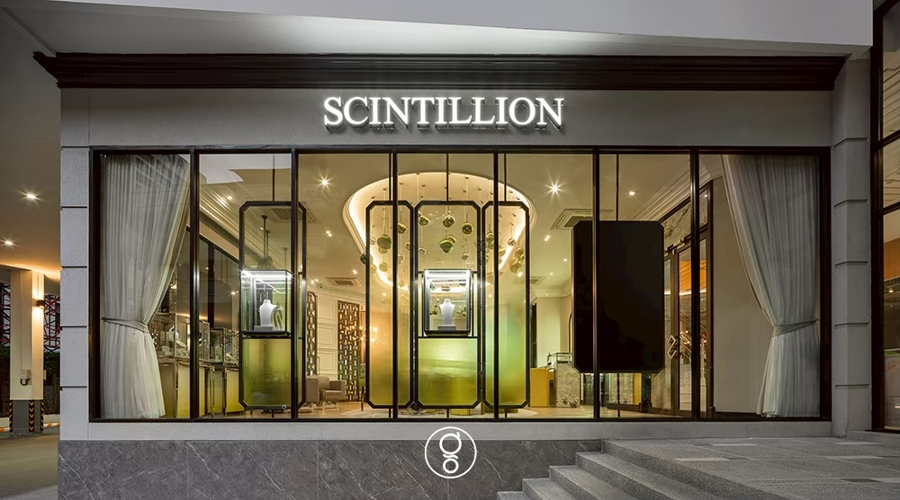 Scintillion shopfront on Surawongse Road, Bangkok, lit at the street edge
