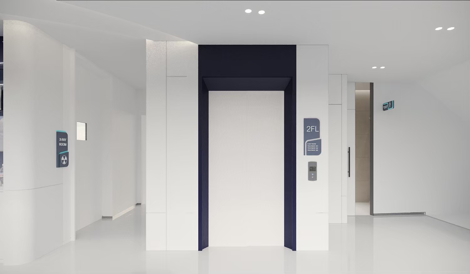 Dental hospital lift lobby with floor directory signage