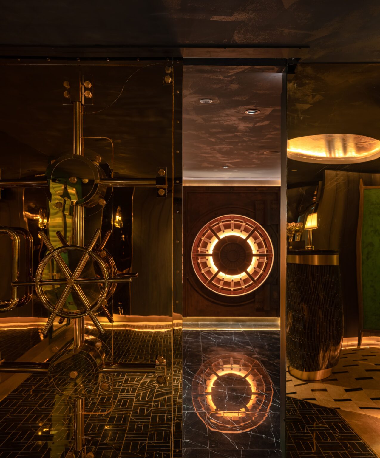 Brass apparatus and a lit ring emblem in the corridor
