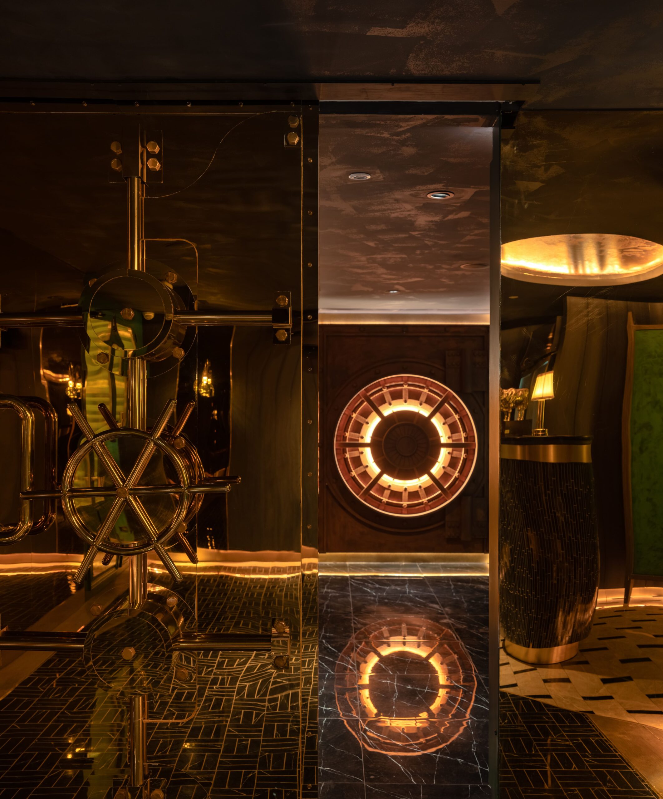 Brass apparatus and a lit ring emblem in the corridor