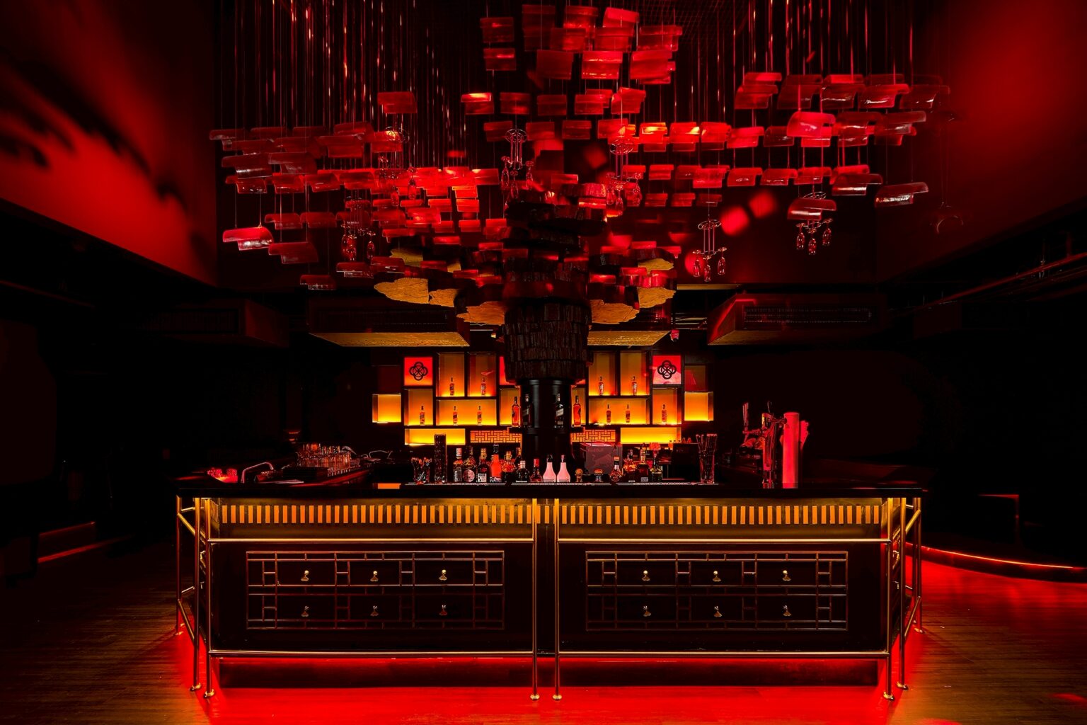 MU:IN Bangkok nightclub interior design — Back bar — a suspended installation holds the low light