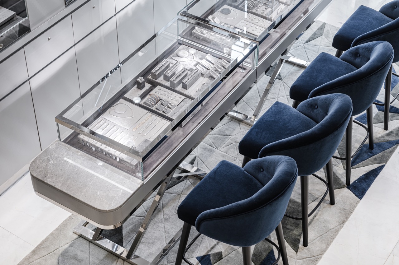 Overhead view of the diamond counter and the faceted marble floor inlay at Petch Thailand