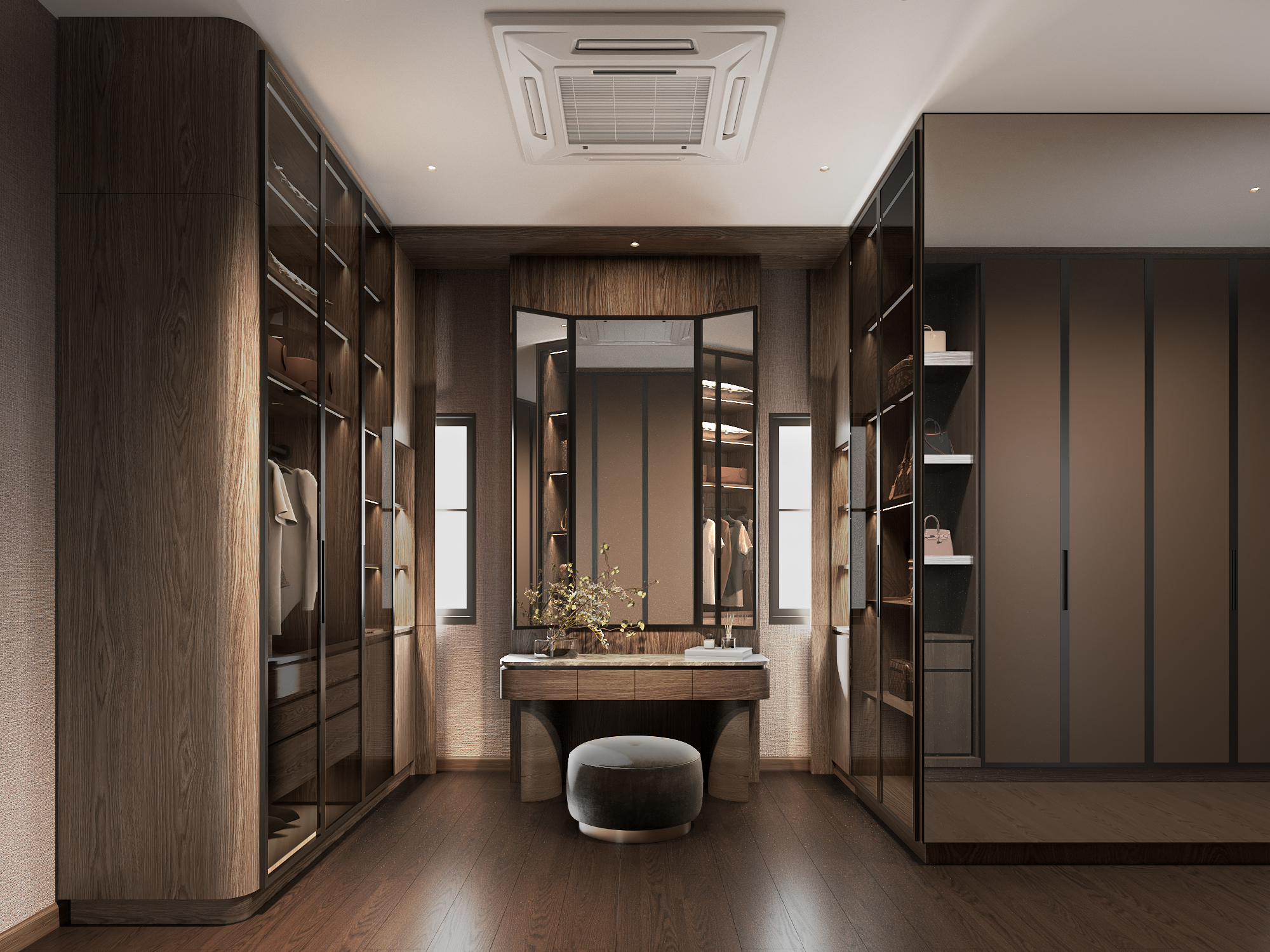 Walk-in dressing room with smoked-glass wardrobe doors, backlit shelving and tri-fold mirror over a marble vanity, interior design by Gratitude Design
