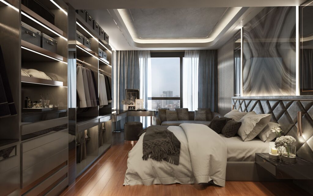 Master bedroom with an adjoining dressing area and full-height window overlooking Sathorn, Bangkok
