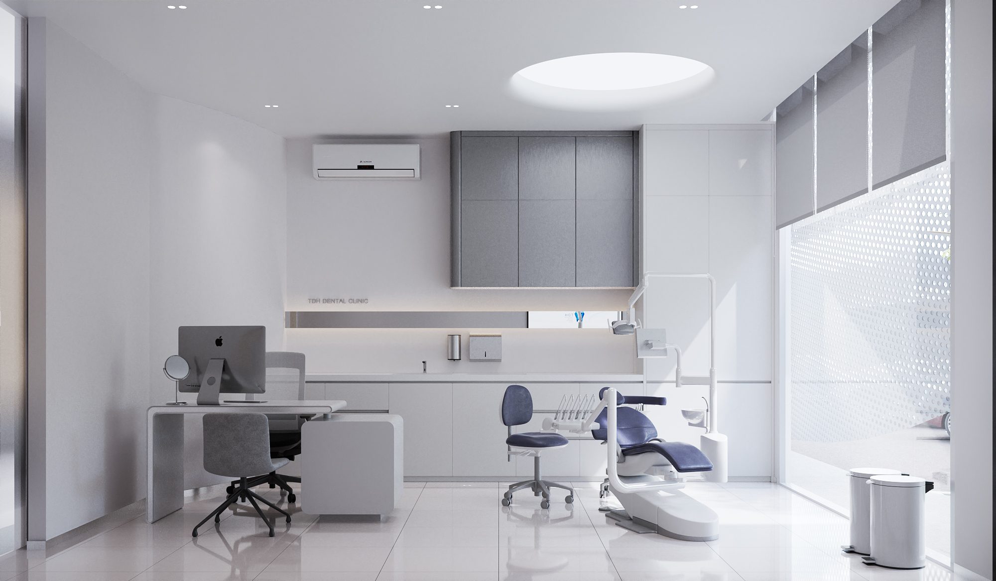 TDH Krungthepkreetha dental clinic interior design — treatment room with restrained finishes, integrated cabinetry and a circular ceiling light