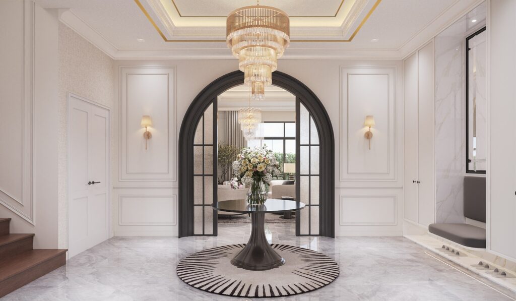 The Palazzo private residence interior design in Bangkok, central hall with a tiered crystal chandelier and a black-framed arch opening to the living room