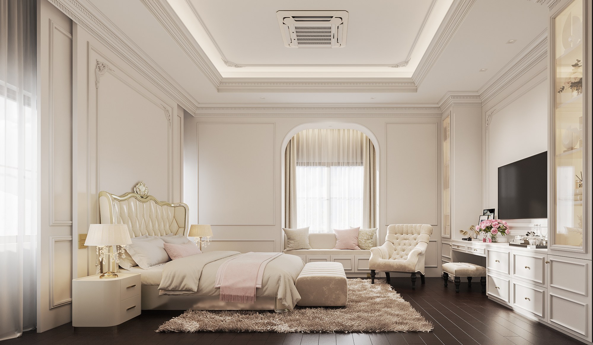 The Palazzo bedroom in cream and blush — an upholstered bed with a carved headboard, an arched window seat, a tufted armchair and a built-in dressing table